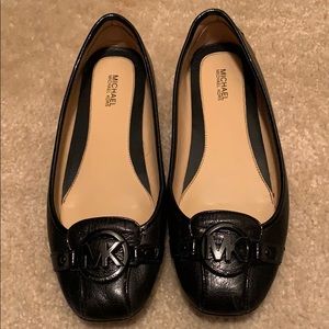 MK black flats